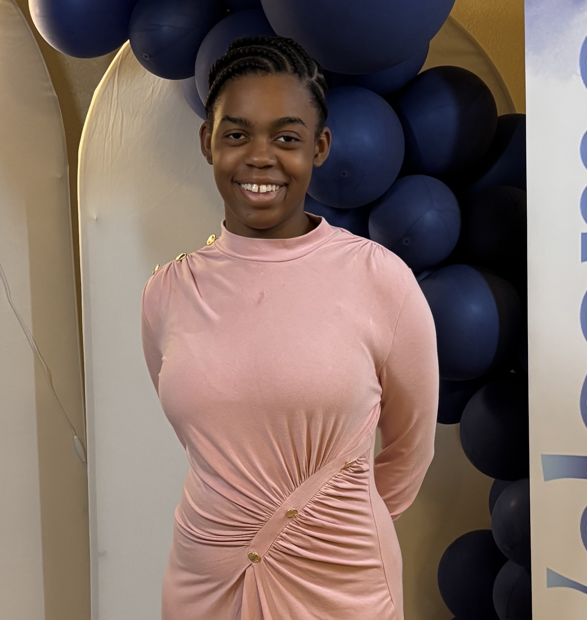 A picture of her smiling