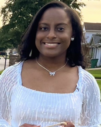A picture of her smiling