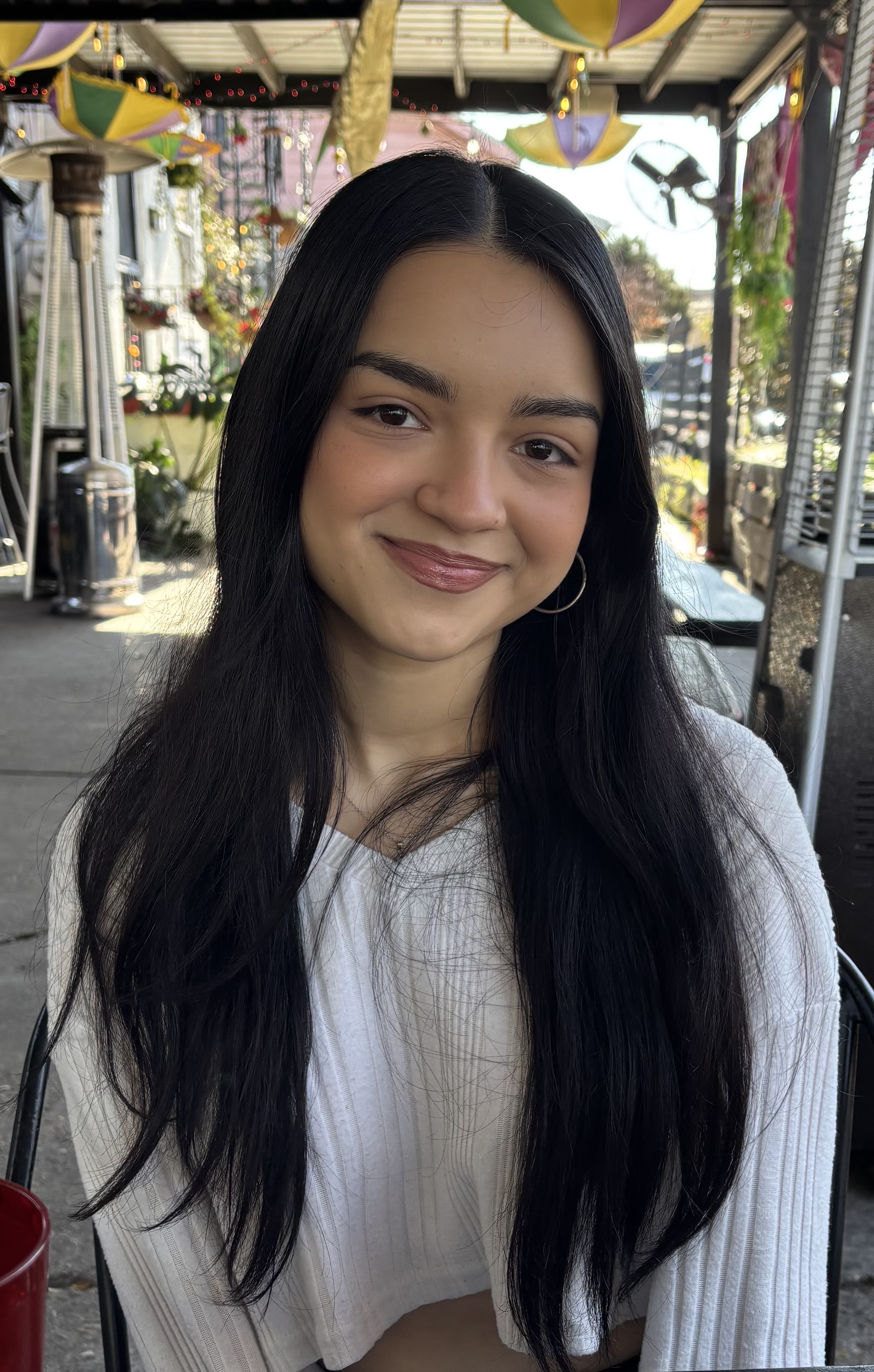 A picture of her smiling