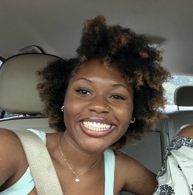 A picture of her smiling
