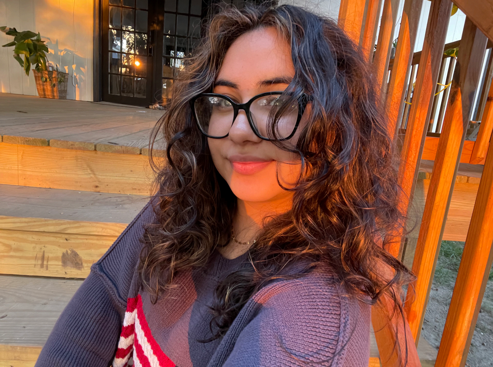 A picture of her smiling