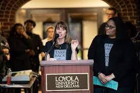 Picture of the Director at the WRC giving the introductory speech at the annual Take Back the Night