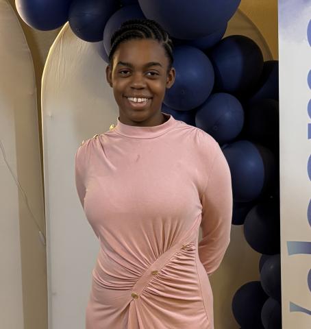 A picture of her smiling