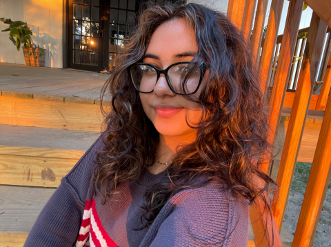 A picture of her smiling